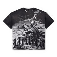 A black short-sleeve graphic T-shirt featuring a monochrome illustration of the Statue of Liberty with a skull face and the text 'Vtilted' and 'manifested dreams' on the front, shown against a plain white background.
