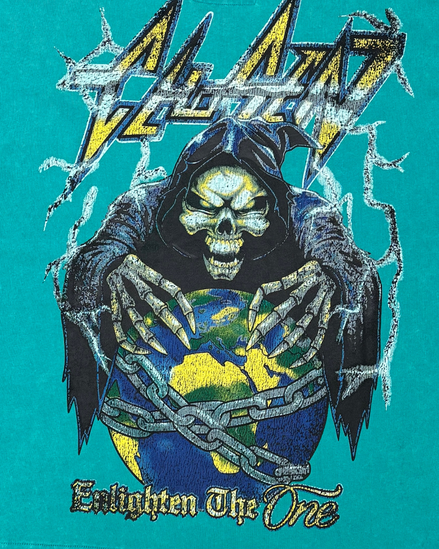 T-shirt with a graphic of a skeleton holding a world map, surrounded by text and symbols on a teal background.