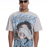 Man wearing a graphic t-shirt with michael jackson's face design and text on a white background