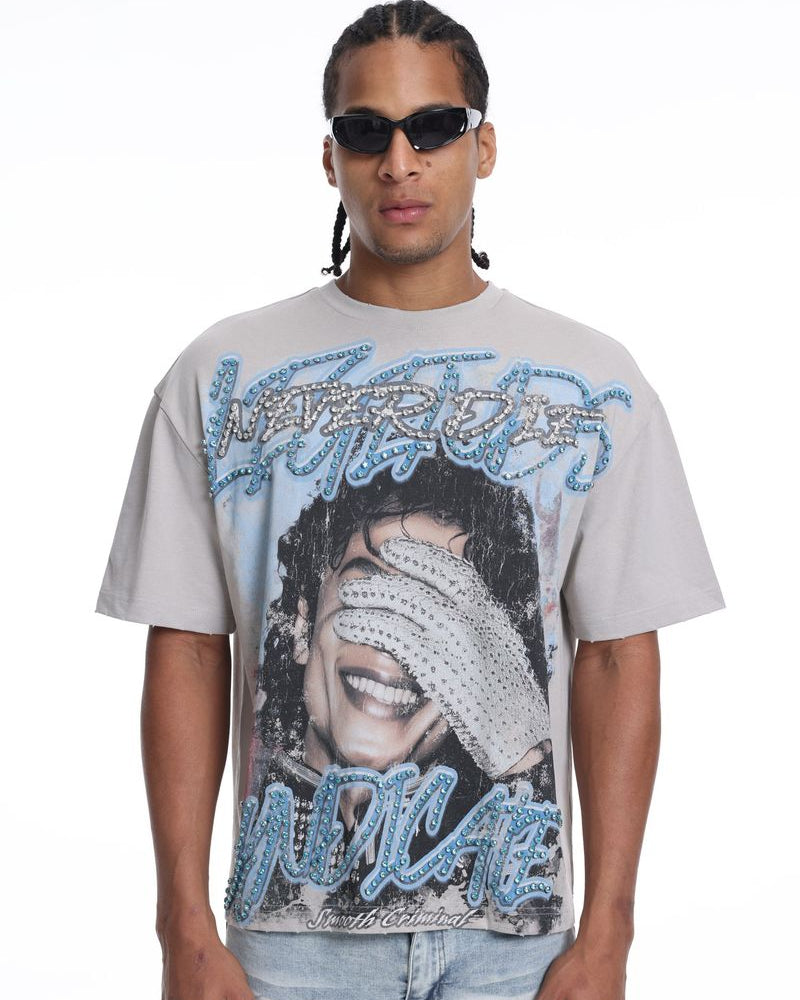 Man wearing a graphic t-shirt with michael jackson's face design and text on a white background
