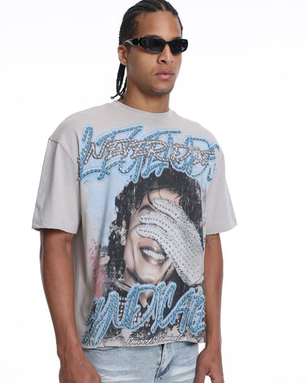 Person wearing a graphic t-shirt with a design of michael jackson on a white background