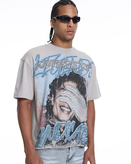 Person wearing a graphic t-shirt with a design of michael jackson on a white background