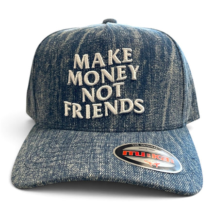A blue denim-style baseball cap with the phrase 'MAKE MONEY NOT FRIENDS' embroidered in white on the front. A visible sticker on the brim reads 'Tulip'.