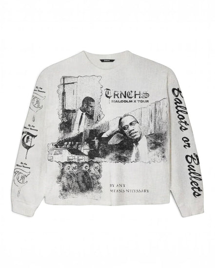 An off-white long-sleeve crewneck sweatshirt featuring a black graphic print of Malcolm X and the text 'TRNCHS MALCOLM X TOUR' on the front, with additional black text down both sleeves, displayed flat against a white background.