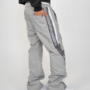 Gray tracksuit pants with white stripes on a white background
