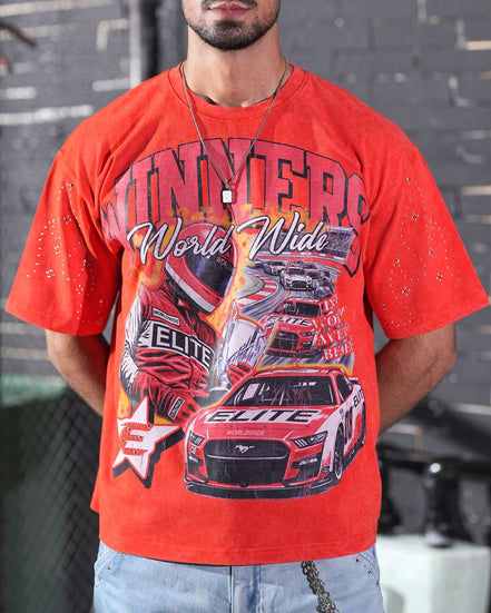 Person wearing a red t-shirt with car graphics and text.