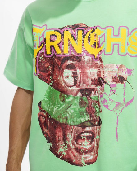 Person wearing a green t-shirt with a graphic design and text.