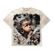 A beige short-sleeve t-shirt with a large graphic print of a cherub wearing a crown, with the text 'Vilted' and 'The Future Is Here' on a white background.