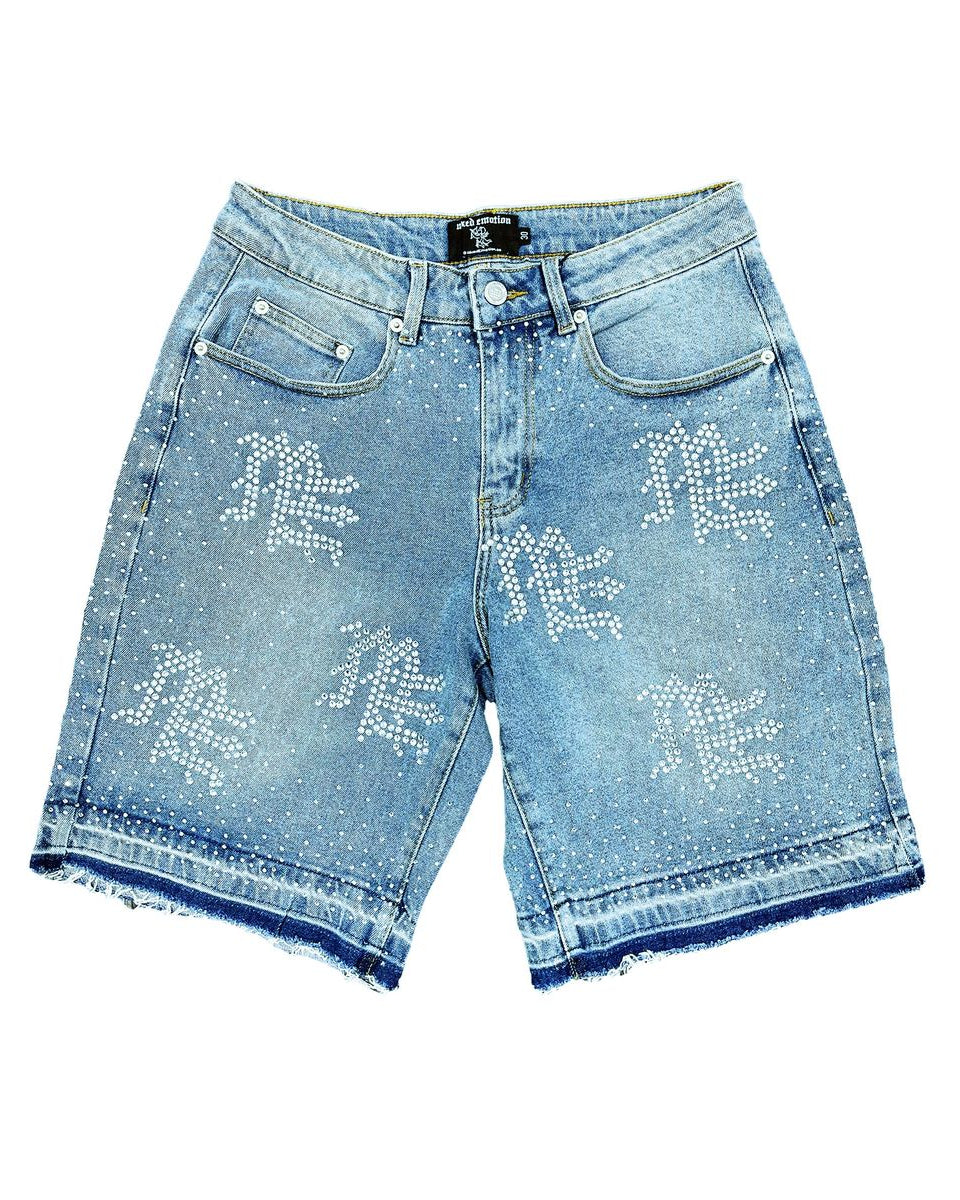 Blue denim shorts with decorative elements on a white background