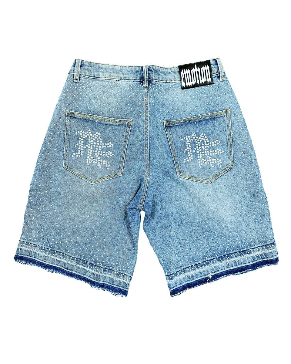 Light blue denim shorts with rhinestone embellishments on a white background
