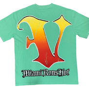 Green t-shirt with a colorful 'V' design and 'Miami Runs Hot' text on a white background