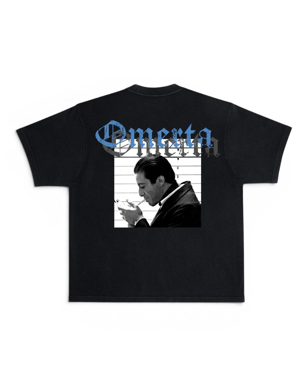 A black short-sleeve t-shirt with a graphic print on the front. The print features the word 'Omerta' in a blue Gothic font above a black-and-white photo of a man smoking a cigarette, set against a white background.
