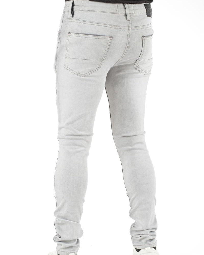 Light gray jeans on a white background