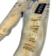 Distressed jeans with a brand label on a white background