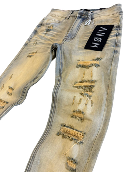 Distressed jeans with a brand label on a white background