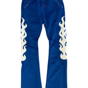 Blue sweatpants with white flame designs on a white background