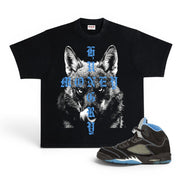 A black graphic t-shirt featuring a wolf design with blue gothic text reading 'MONEY HUNGRY', displayed next to a black and blue high-top sneaker on a white background.