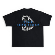 A black short-sleeve t-shirt shown flat against a white background, featuring a graphic on the back with a circular arrangement of white teeth and blue gothic-style text reading 'RICH DEAD IDOLS'.