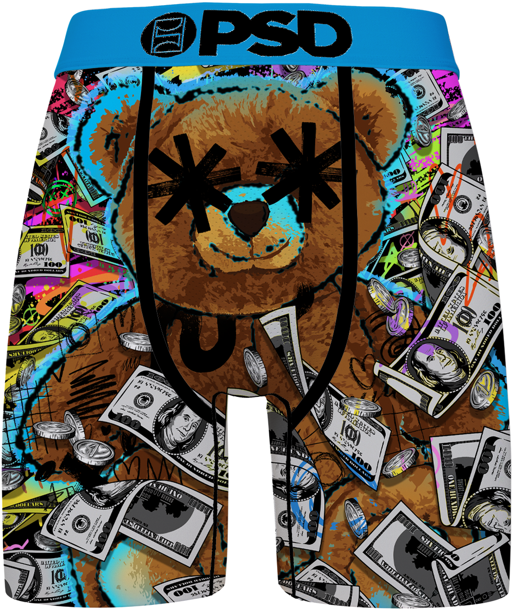 A pair of men's boxer briefs featuring a colorful graffiti-style graphic print with a large teddy bear face, dollar bills, coins, and neon accents. The waistband is bright blue with the black text 'PSD'.