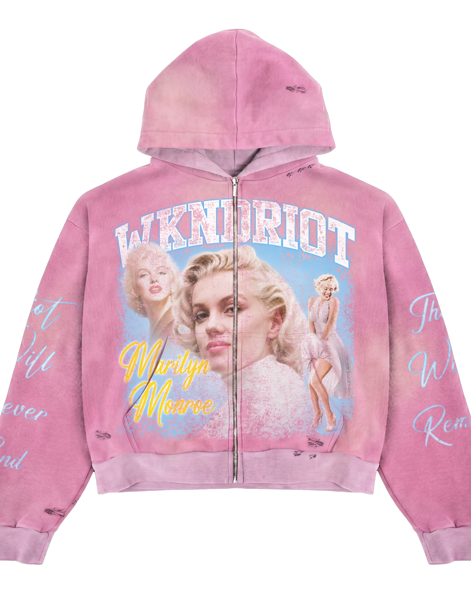 A pink zip-up hoodie featuring a vintage-style Marilyn Monroe graphic print on the front with the text 'WKNDRIOT' and 'Marilyn Monroe', shown against a plain white background.