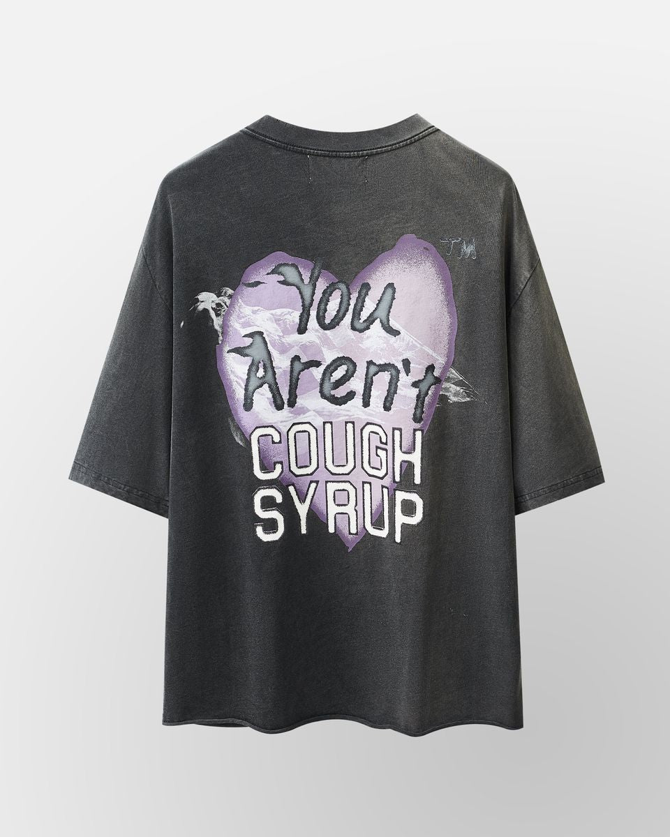 Black t-shirt with graphic design and text on a light gray background