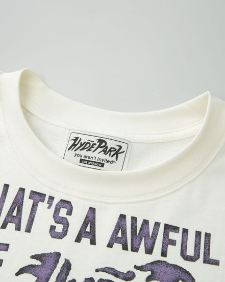 White t-shirt with purple text and Hyde Park label on a gray background