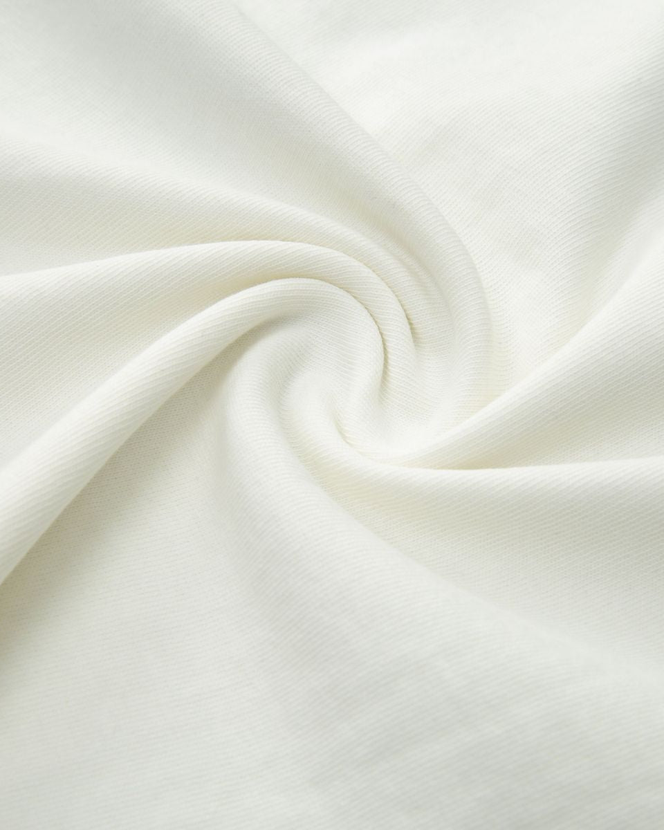Close-up of white fabric with a subtle texture