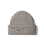 Beige knit beanie with 'VALABASAS' embroidery on a white background