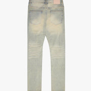 Light blue distressed jeans on a white background