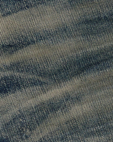 Close-up of denim fabric with a blue and gray pattern