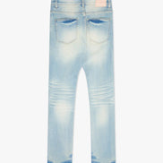 Light blue distressed jeans on a white background