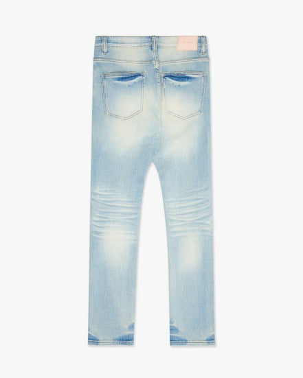Light blue distressed jeans on a white background
