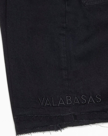 Black fabric with 'VALABASAS' branding on a white background