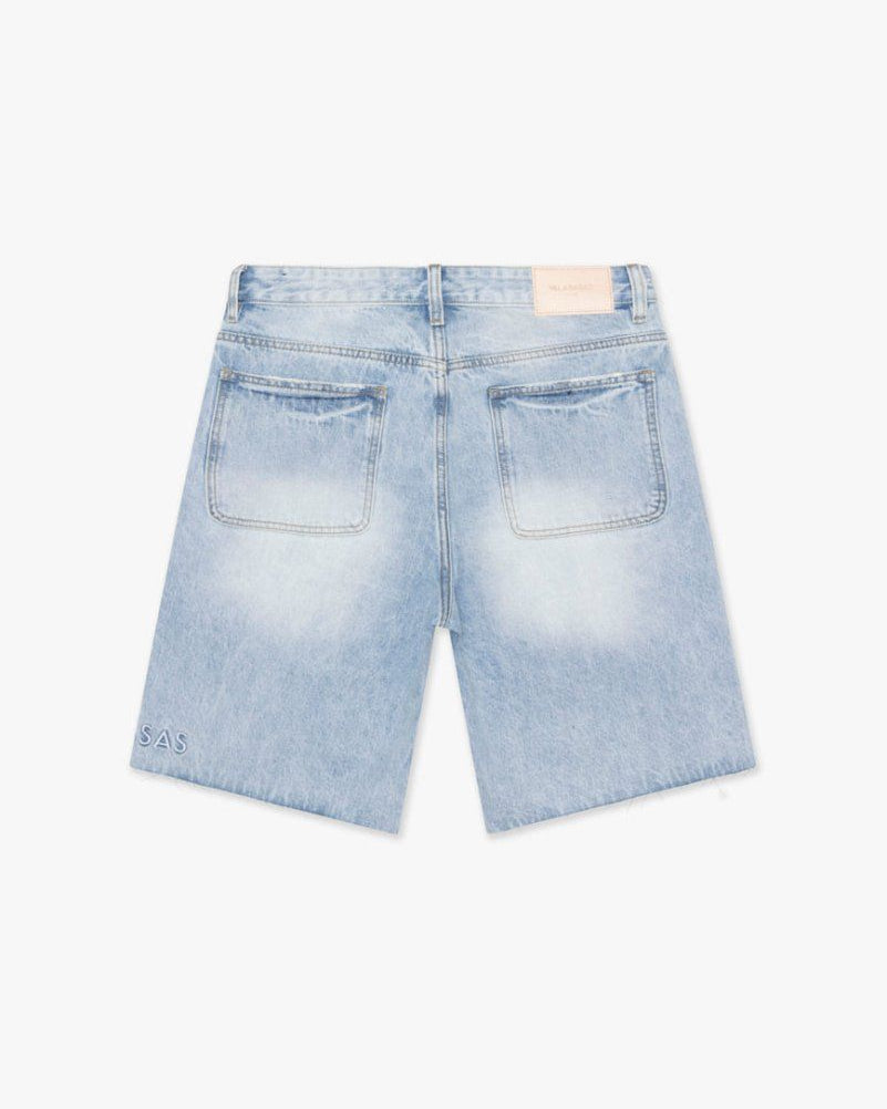 Light blue denim shorts on a white background