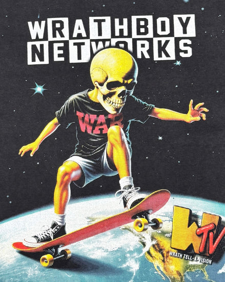 A stylized graphic print featuring a skull-faced figure in a black t-shirt and shorts riding a skateboard over a planet, with the large text 'WRATHBOY NETWORKS' at the top and a 'WTV' logo in the lower right.