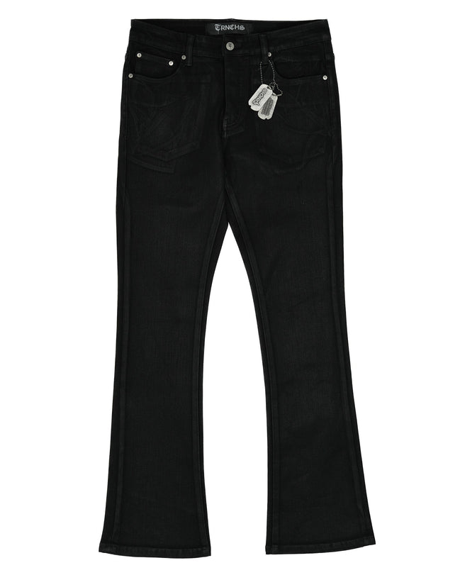 Black jeans with a tag on a white background
