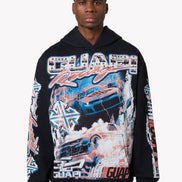 Person wearing a black hoodie with colorful graphics and text on a white background