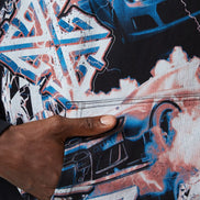 Close-up of a person holding a phone with a colorful, abstract design on the screen.