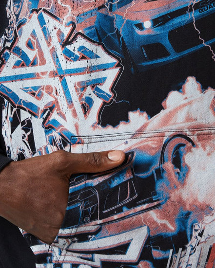 Close-up of a person holding a phone with a colorful, abstract design on the screen.