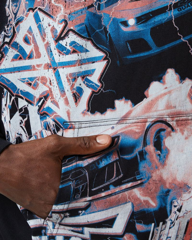 Close-up of a person holding a phone with a colorful, abstract design on the screen.