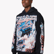 Person wearing a black hoodie with colorful graphic design on a white background