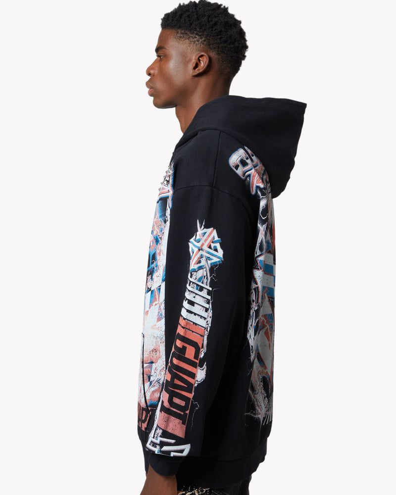 Person wearing a black hoodie with colorful graphic designs on a white background