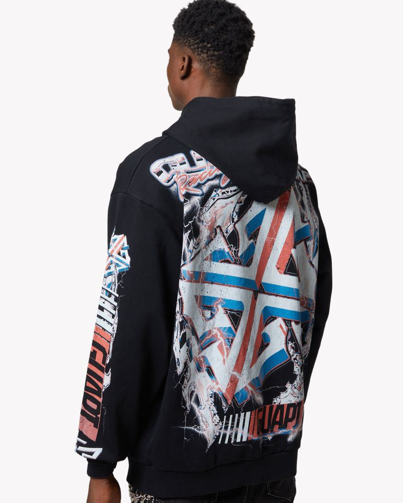 Person wearing a black hoodie with colorful graphic designs on the back against a white background