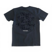 Black t-shirt with text on the back on a white background