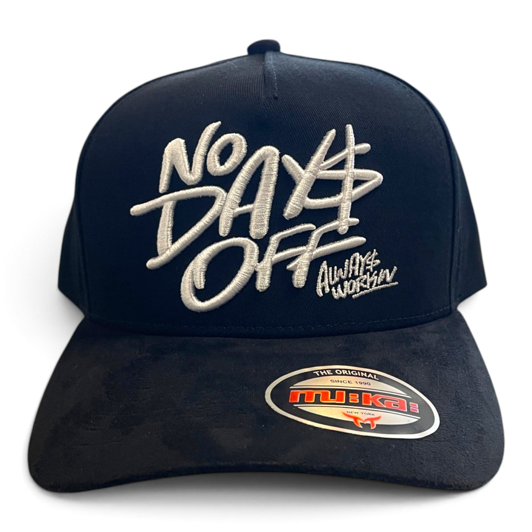 A black trucker-style cap with white embroidered text reading 'No Days Off' and 'Always Workin' on the front, plus a visible Mikai sticker on the brim, shown on a plain white background.