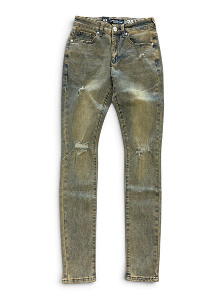 Distressed skinny jeans in a faded olive green wash with light abrasion and whiskering, shown flat against a white background.