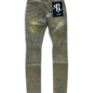 A pair of slim-fit jeans in a washed olive green or khaki-tan denim, shown from the back on a white background. The back right pocket features a black brand patch with a white monogram logo, and a black waistband label reads '28'.