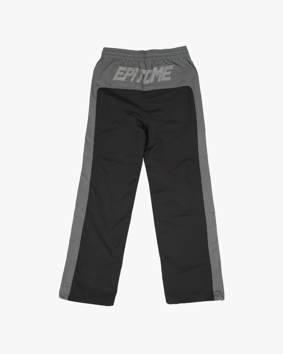 Black and gray pants with 'Exo' branding on a white background