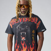 Person wearing a black t-shirt with a panther graphic and text on a gray background