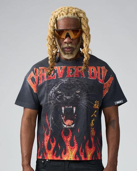 Person wearing a black t-shirt with a panther graphic and 'Forever Duaa' text on a gray background